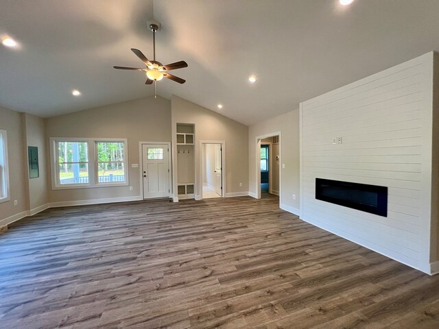 366 N Glebe Rd, Montross, VA 22520 - unfurnished living room featuring a large fireplace, dark wood-style flooring, a ceiling fan, baseboards, and recessed lighting