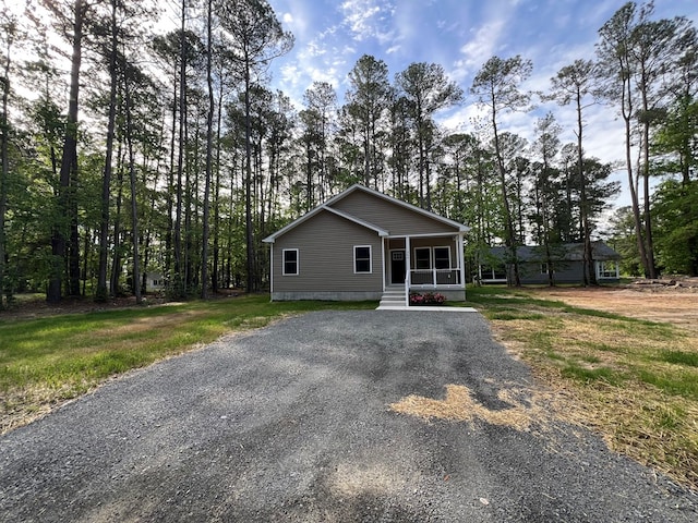 366 N Glebe Rd, Montross, VA 22520 - view of front of property with driveway and a sunroom
