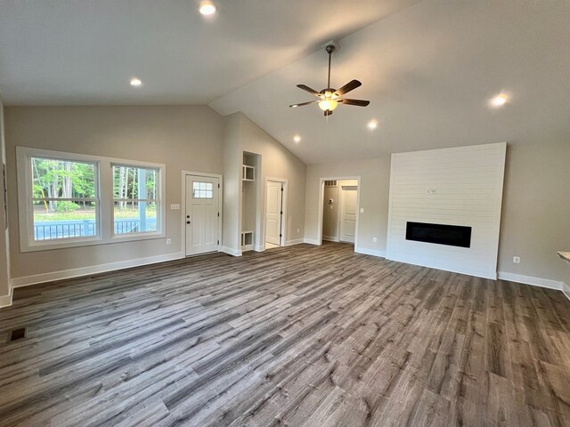 366 N Glebe Rd, Montross, VA 22520 - unfurnished living room with dark wood-style flooring, ceiling fan, baseboards, a large fireplace, and recessed lighting