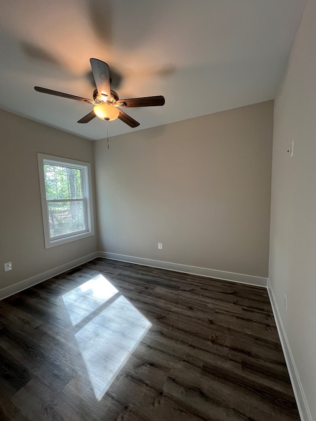 366 N Glebe Rd, Montross, VA 22520 - empty room featuring dark wood-style floors, a ceiling fan, and baseboards