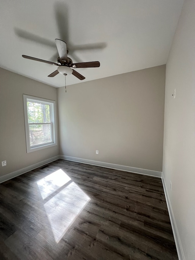 366 N Glebe Rd, Montross, VA 22520 - empty room featuring dark wood-style floors, baseboards, and a ceiling fan