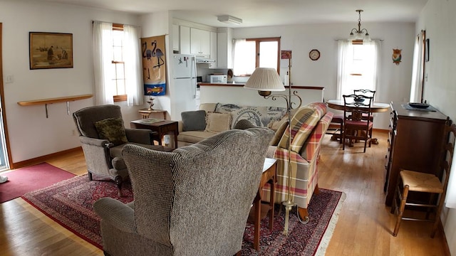 2012 Millenbeck Rd, Lancaster, VA 22503 - living room with a wealth of natural light and light wood finished floors