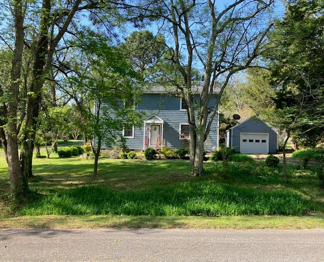 2012 Millenbeck Rd, Lancaster, VA 22503 - view of front of home featuring an outbuilding, a detached garage, and a front yard