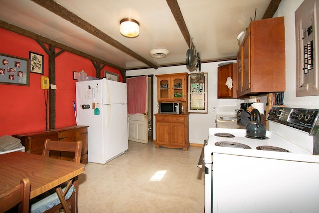 1026 Hoecake Rd, Lancaster, VA 22503 - kitchen with white appliances, beam ceiling, brown cabinets, light flooring, and glass insert cabinets