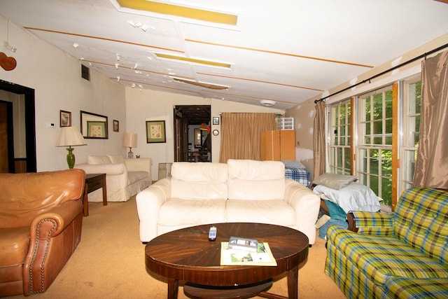 1026 Hoecake Rd, Lancaster, VA 22503 - living room featuring carpet and vaulted ceiling