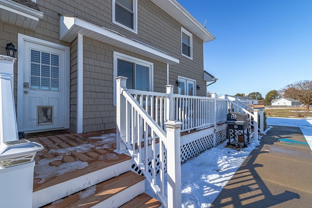 wooden deck featuring area for grilling