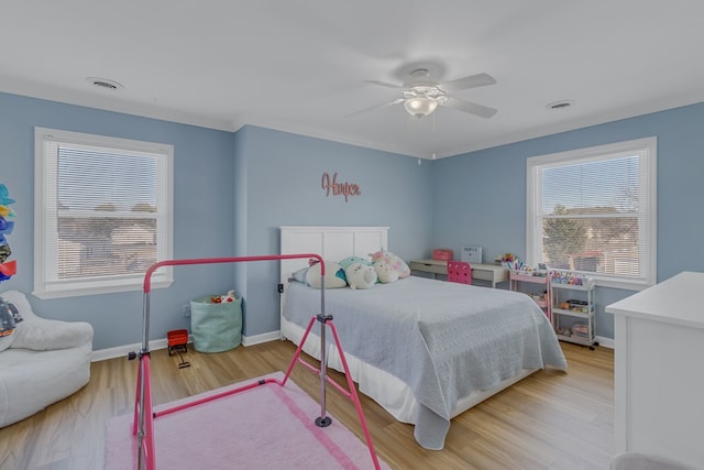 bedroom featuring ceiling fan and light hardwood / wood-style flooring