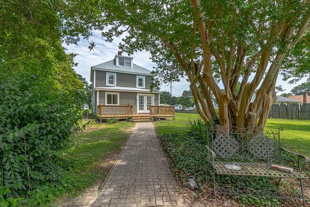 19 Wharton Grove Ln, Weems, VA 22576 - american foursquare style home with french doors and a deck
