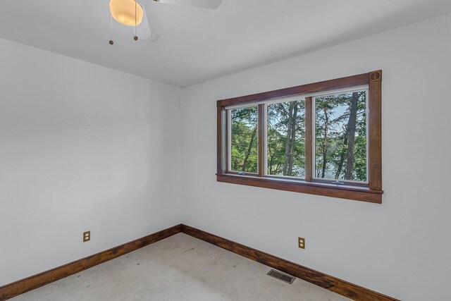 912 Levelgreen Rd, Lancaster, VA 22503 - carpeted empty room featuring baseboards