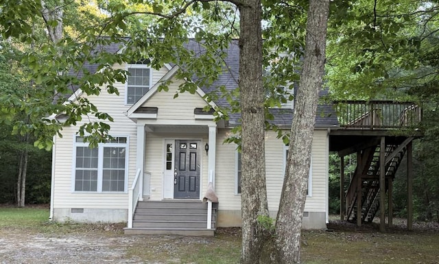 1 Bull Creek Dr, Lancaster, VA 22503 - view of front facade featuring crawl space, stairs, and a deck