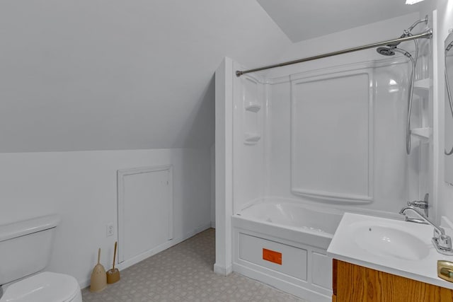 1 Bull Creek Dr, Lancaster, VA 22503 - bathroom featuring tile patterned floors, washtub / shower combination, toilet, vanity, and vaulted ceiling