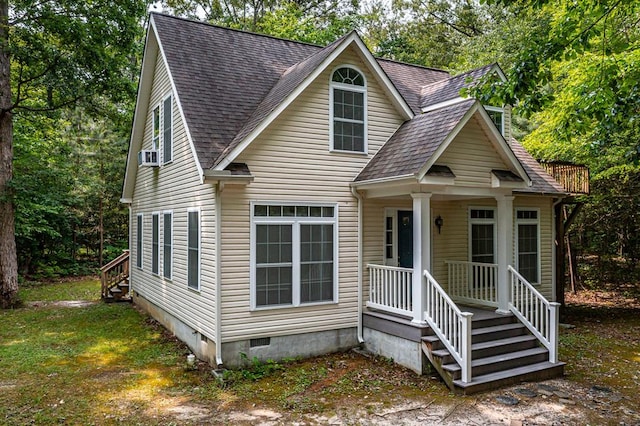 1 Bull Creek Dr, Lancaster, VA 22503 - view of front facade featuring roof with shingles, a porch, and crawl space