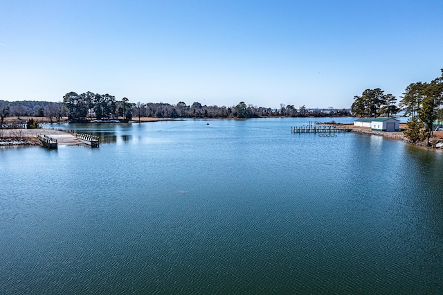 property view of water featuring a dock