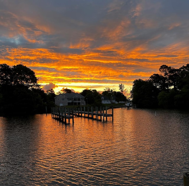 property view of water featuring a boat dock