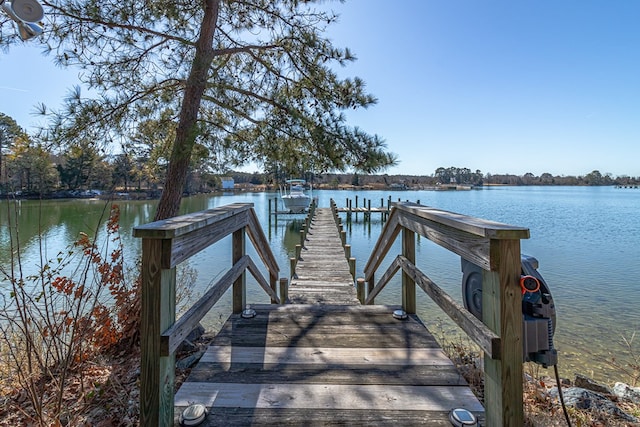 view of dock with a water view