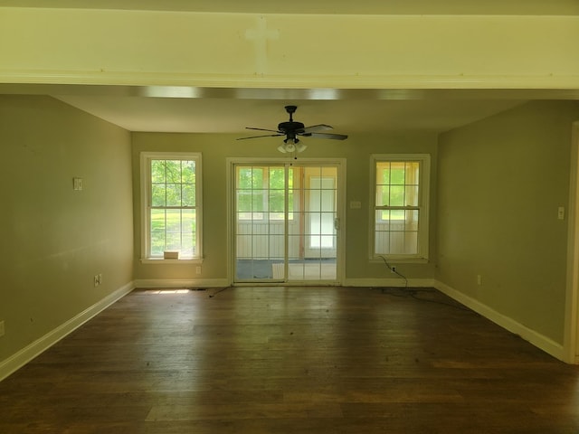 31 Moccasin Trl, Weems, VA 22576 - unfurnished room with dark wood finished floors, plenty of natural light, and ceiling fan
