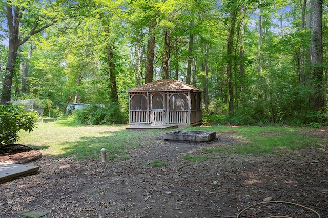 63 Pioneer Trl, Hague, VA 22469 - view of yard featuring a view of trees and a gazebo