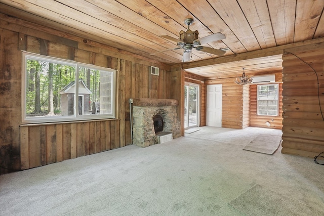 63 Pioneer Trl, Hague, VA 22469 - unfurnished living room with wood ceiling, carpet flooring, ceiling fan, a stone fireplace, and a chandelier
