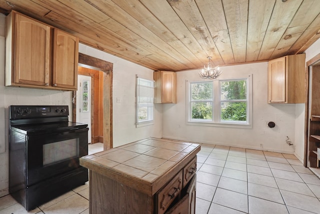 63 Pioneer Trl, Hague, VA 22469 - kitchen with black electric range, tile counters, wood ceiling, light tile patterned floors, and a chandelier