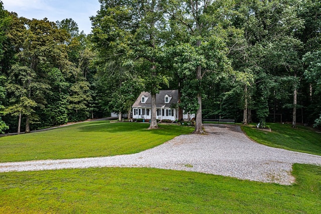 3503 Canal Rd, Farnham, VA 22460 - new england style home featuring gravel driveway, a front yard, and a wooded view