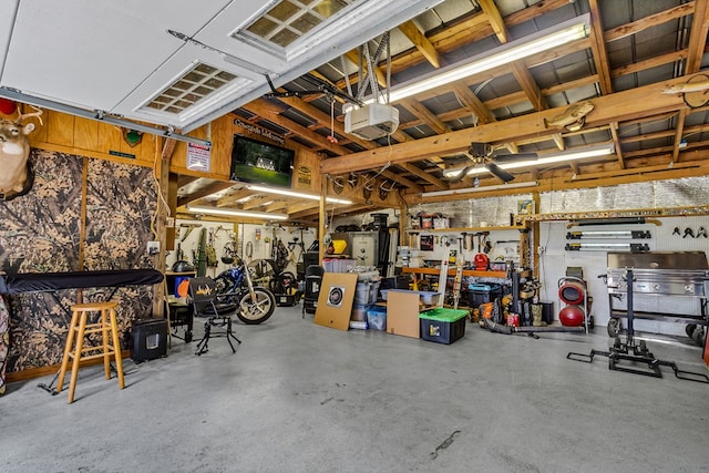 3503 Canal Rd, Farnham, VA 22460 - garage featuring a garage door opener and a workshop area