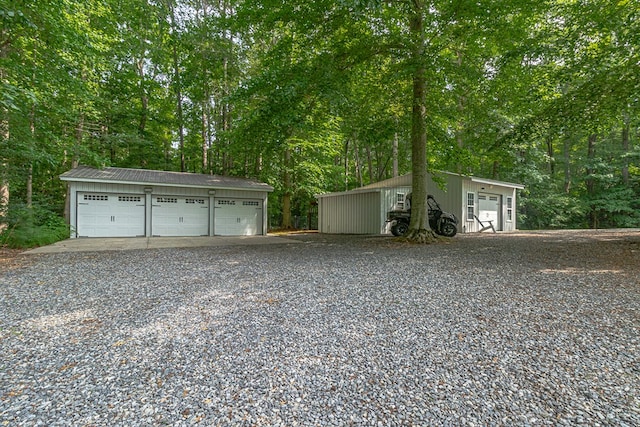 3503 Canal Rd, Farnham, VA 22460 - detached garage featuring view of wooded area