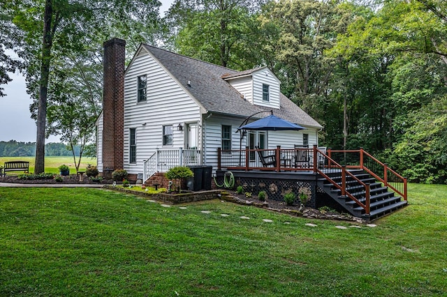 3503 Canal Rd, Farnham, VA 22460 - view of front facade featuring stairs, a chimney, a deck, a front yard, and a shingled roof
