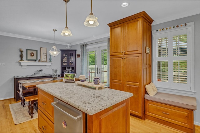 3503 Canal Rd, Farnham, VA 22460 - kitchen featuring light wood finished floors, a kitchen island, brown cabinetry, dishwasher, and decorative light fixtures
