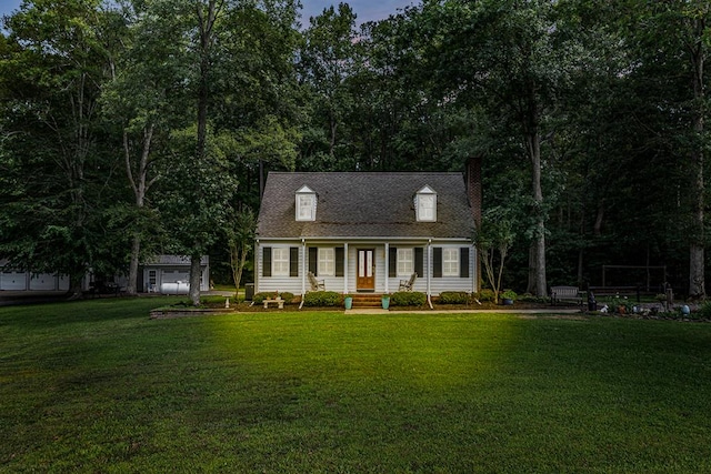 3503 Canal Rd, Farnham, VA 22460 - cape cod house featuring a front yard and a chimney