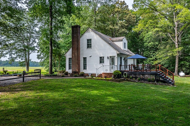 3503 Canal Rd, Farnham, VA 22460 - back of property with a wooden deck, a chimney, a yard, and stairway