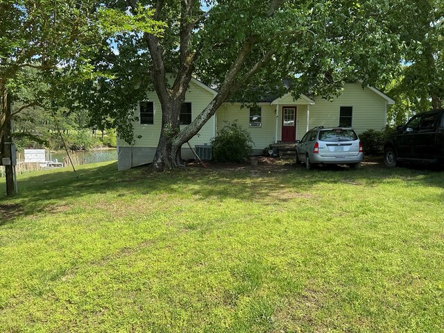 2884 Lake Rd, Lottsburg, VA 22511 - view of grassy yard with a water view and central AC