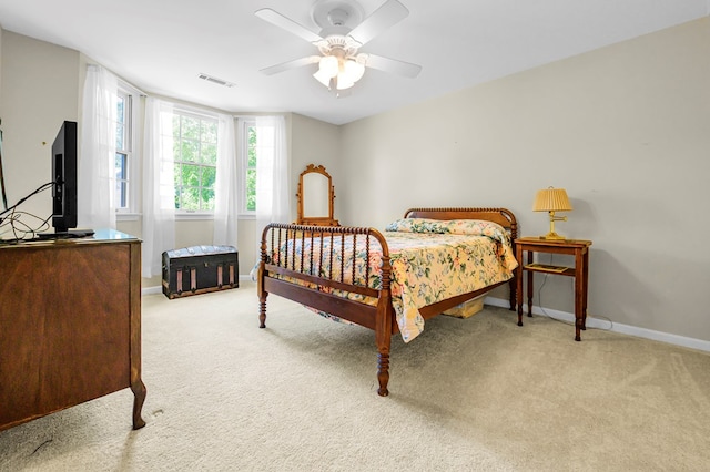 10 Heatherfield Ct, Kilmarnock, VA 22482 - carpeted bedroom with baseboards and ceiling fan