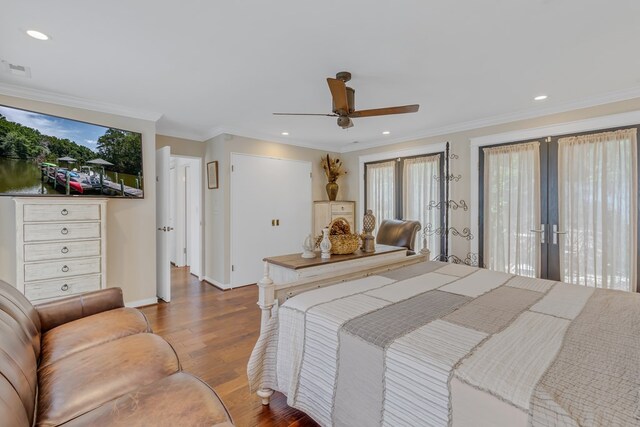 1083 Ottoman Ferry Rd, Lancaster, VA 22503 - bedroom featuring crown molding, wood finished floors, multiple windows, baseboards, and recessed lighting