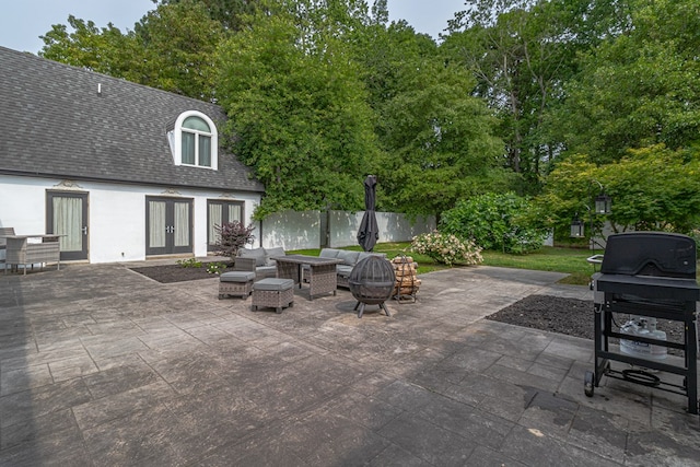 1083 Ottoman Ferry Rd, Lancaster, VA 22503 - view of patio with french doors, an outdoor living space with a fire pit, and grilling area
