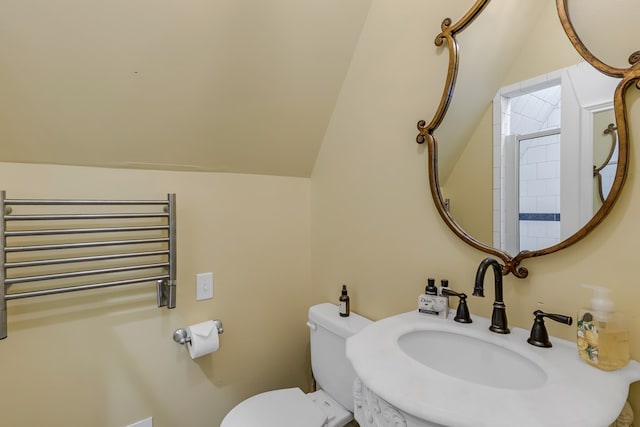 1083 Ottoman Ferry Rd, Lancaster, VA 22503 - bathroom featuring radiator, a sink, toilet, a shower, and a towel warmer