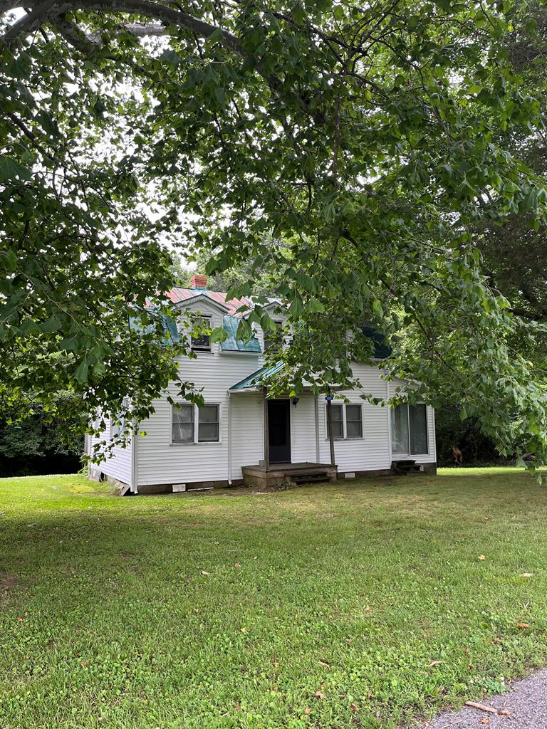 425 Kingston Rd, Heathsville, VA 22511 - view of property hidden behind natural elements featuring a front lawn