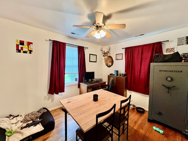 701 Lewis St, Tappahannock, VA 22560 - dining space with ceiling fan and wood finished floors