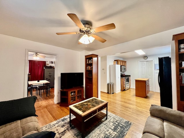 701 Lewis St, Tappahannock, VA 22560 - living area featuring ceiling fan and light wood finished floors
