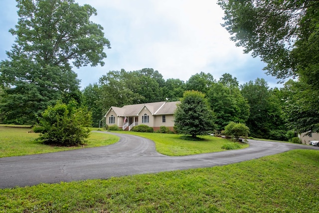1851 Desha Rd, Tappahannock, VA 22560 - ranch-style house featuring a front lawn and asphalt driveway