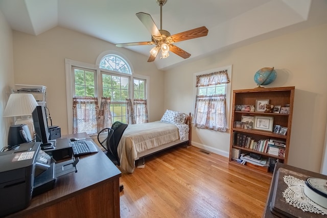 1851 Desha Rd, Tappahannock, VA 22560 - bedroom with light wood finished floors, lofted ceiling, an office area, baseboards, and ceiling fan