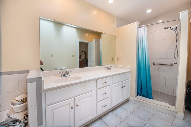 1851 Desha Rd, Tappahannock, VA 22560 - full bathroom featuring a shower stall, double vanity, tile patterned floors, and recessed lighting