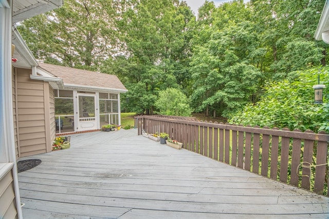 1851 Desha Rd, Tappahannock, VA 22560 - wooden deck with a sunroom