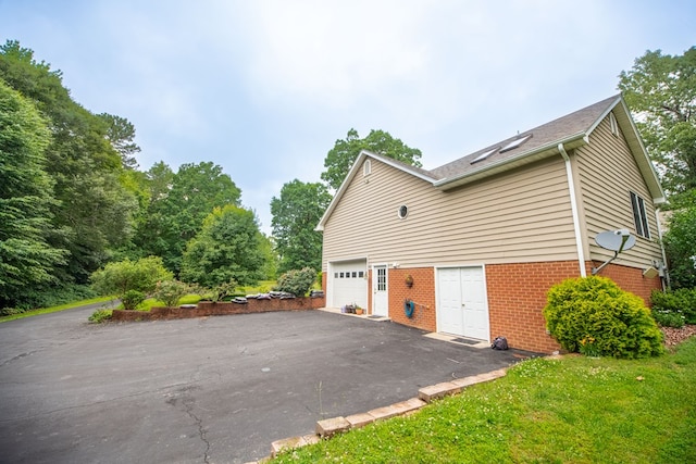 1851 Desha Rd, Tappahannock, VA 22560 - view of side of property featuring asphalt driveway and brick siding