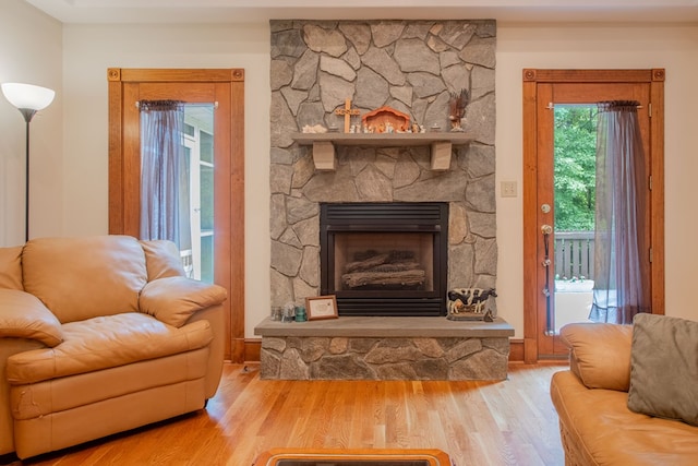 1851 Desha Rd, Tappahannock, VA 22560 - living area with wood finished floors and a fireplace