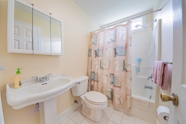 1851 Desha Rd, Tappahannock, VA 22560 - bathroom with toilet, shower / tub combo with curtain, tile patterned flooring, and baseboards