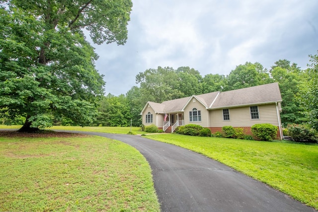 1851 Desha Rd, Tappahannock, VA 22560 - single story home featuring a front lawn and brick siding