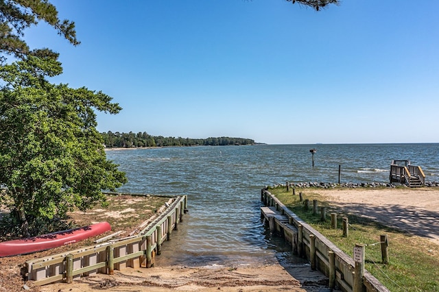 view of dock with a water view