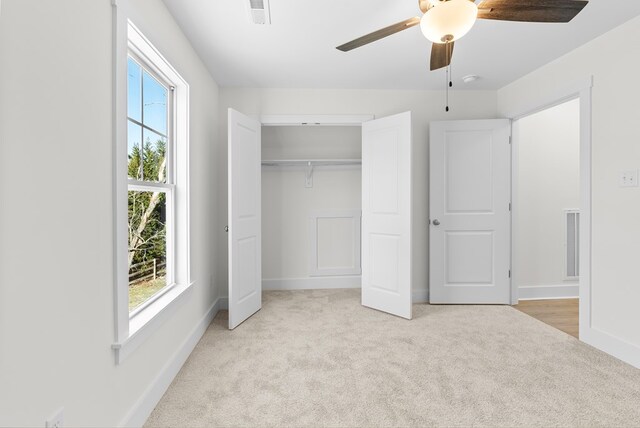 corridor featuring hardwood / wood-style floors