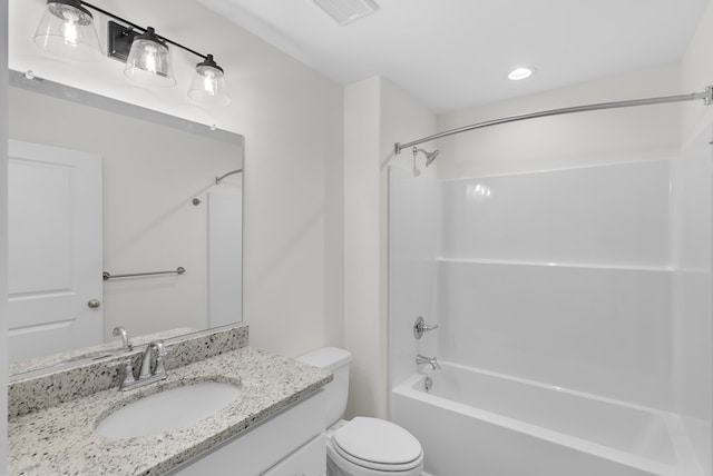 bathroom featuring toilet, washtub / shower combination, vanity, and visible vents