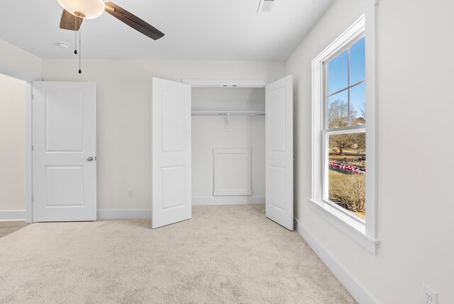 additional living space featuring ceiling fan, lofted ceiling, and carpet floors